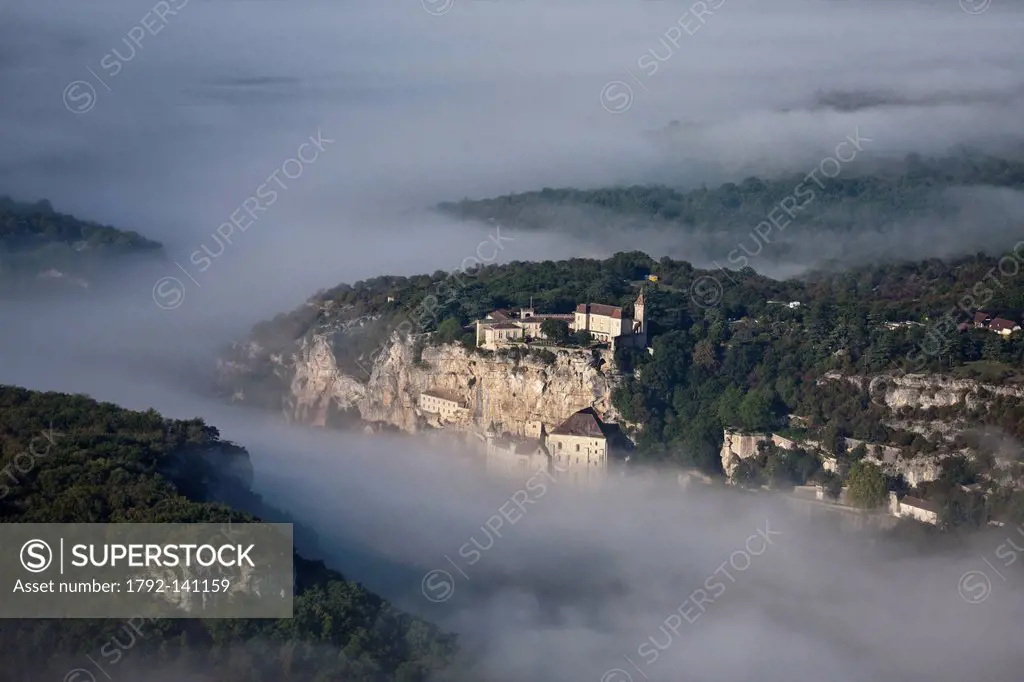 France, Lot, Rocamadour, Aerial view of the city and its religious shrines dominated by its castle in the Canyon of the Alzou