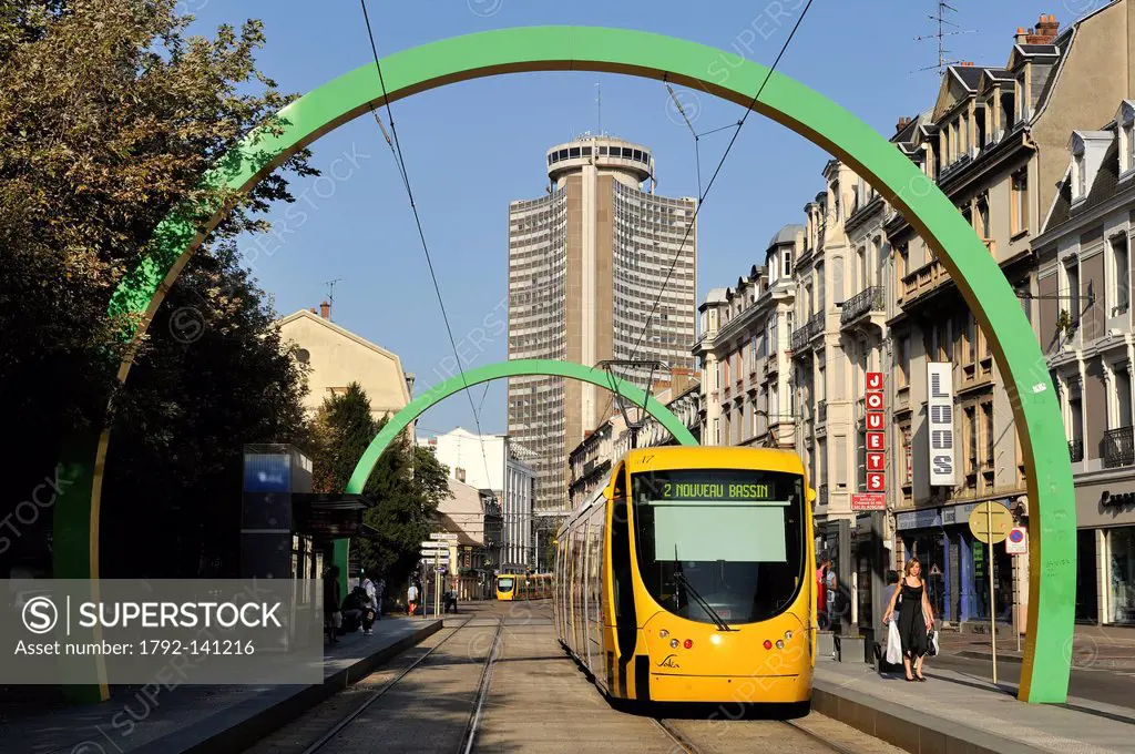 France, Haut Rhin, Mulhouse, tramway going throuth the Arches by artist Daniel Buren in Avenue du President Kennedy, Tour de l´Europe by architect Fra...