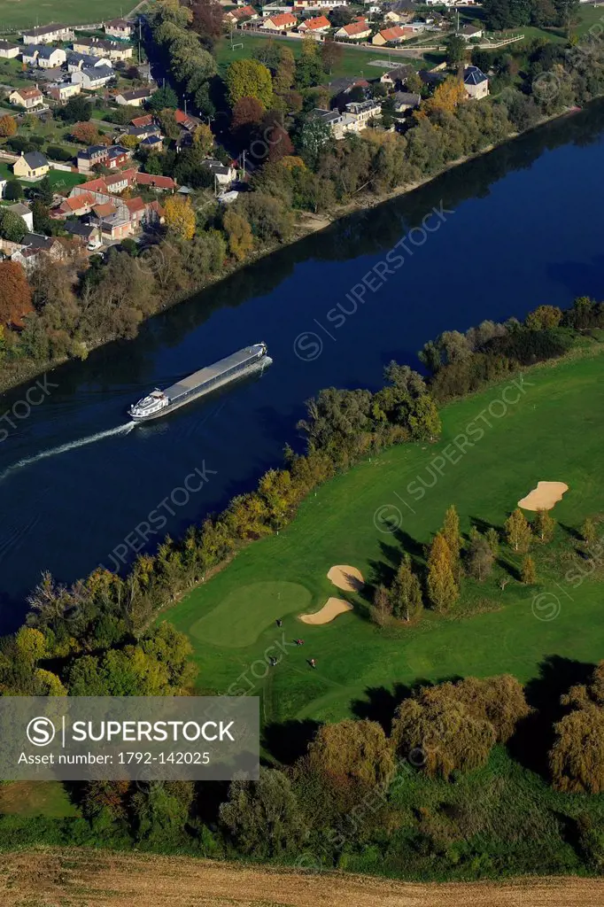 France, Seine_Maritime, golf course of Val_de_Reuil facing the town of Le Manoir Pitres and a barge on the Seine river aerial view