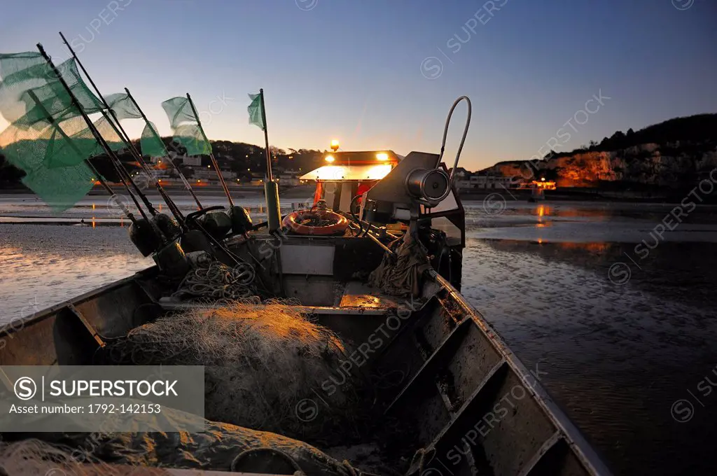 France, Seine Maritime, Veules les Roses, fishing departure on board the boat La Pomme pulled by a tractor on the beach and owned by Anthony Paumier t...