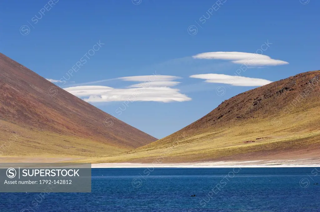 Chili, Antofagasta Region, Altiplano, Los Flamencos National Reserve, Miniques Volcano, clouds altocumulus lenticular above Miscanti Lagoon