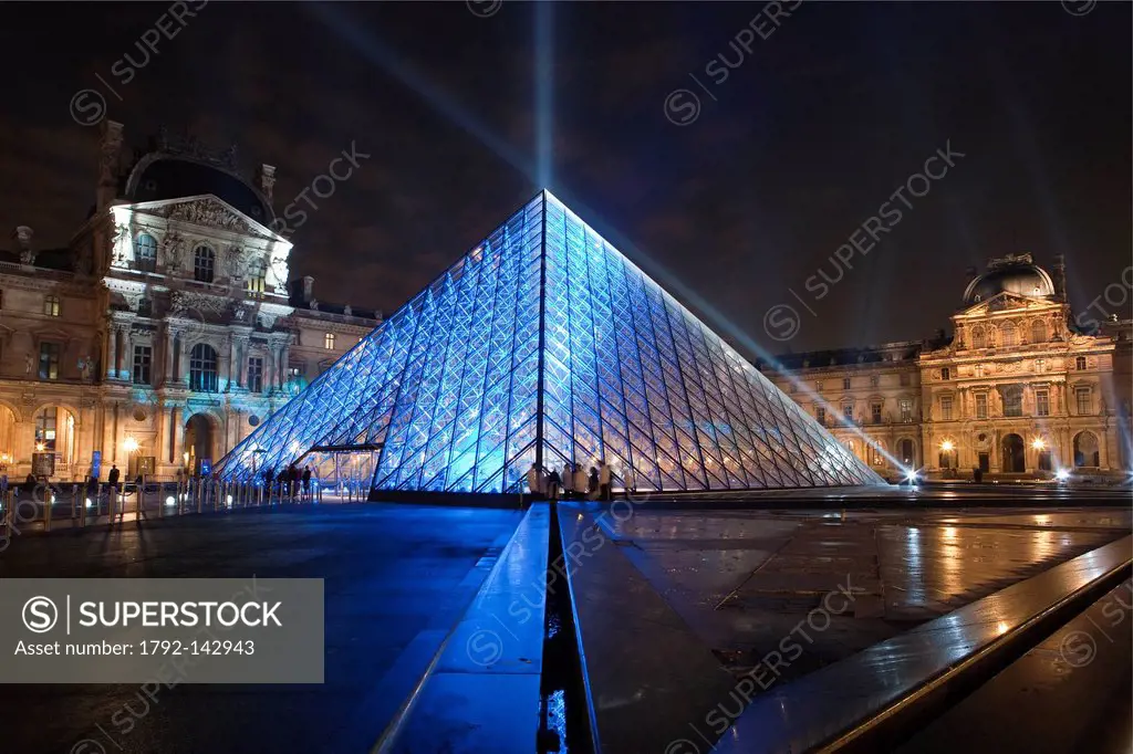 France, Paris, the Louvre Pyramid by the architect Ieoh Ming Pei at night