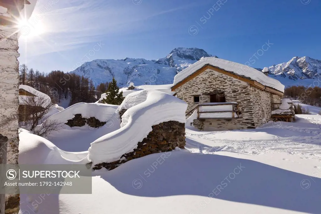 France, Savoie, Sainte Foy Tarentaise, the hamlet of high mountain pasture Le Monal with a view of the Mont Pourri 3779m in the Parc National de la Va...