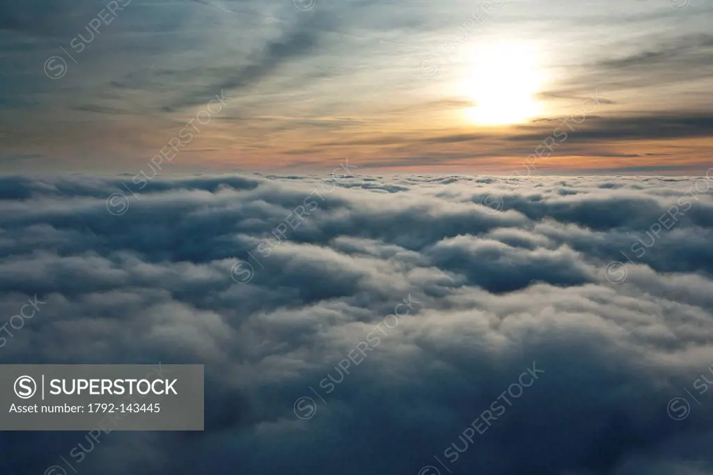 France, Eure, Authevernes, flight between two layers of clouds aerial view
