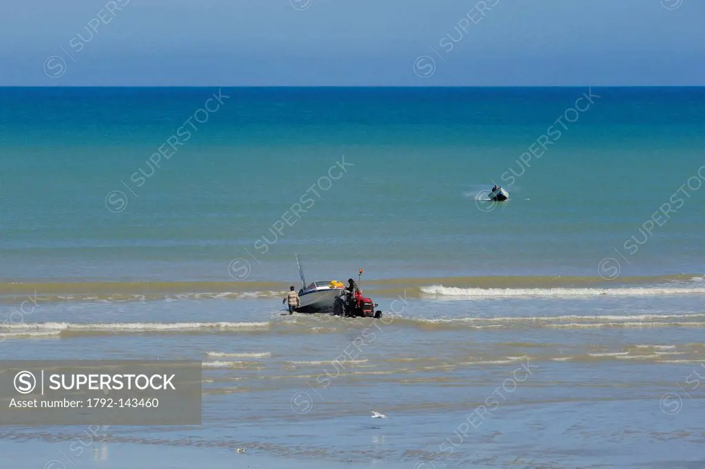 France, Seine Maritime, Veules les Roses, fishing departure on board the boat La Pomme pulled by a tractor on the beach