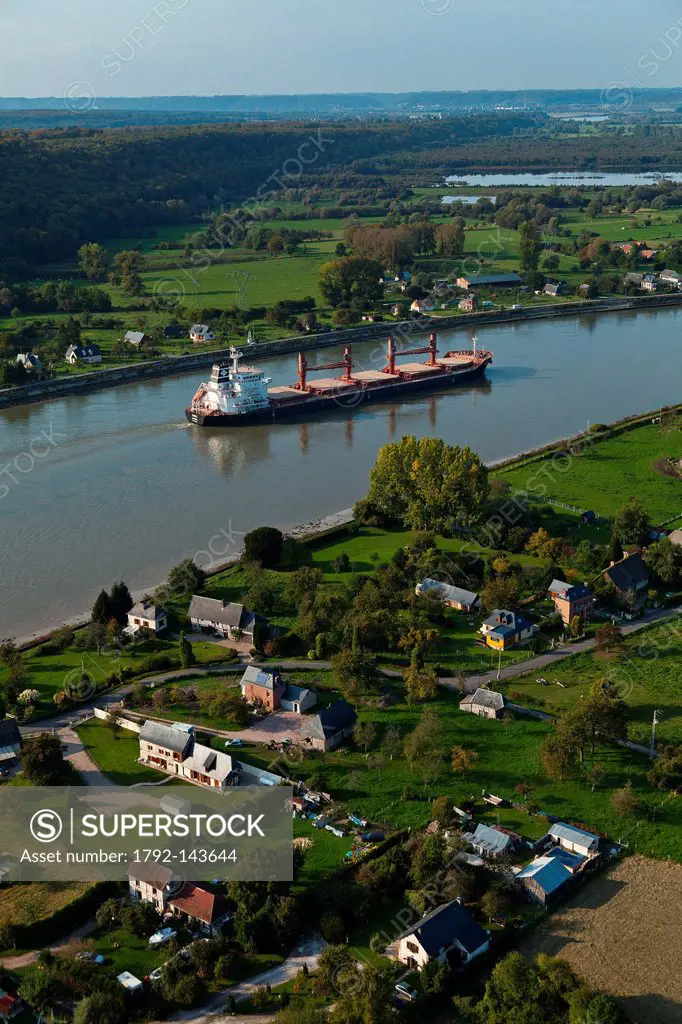 France, Seine Maritime, Jumieges, a cargo ship on the Seine river aerial view