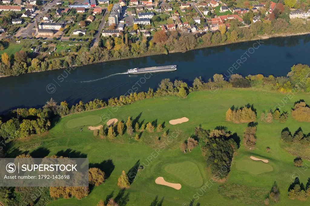 France, Seine_Maritime, golf course of Val_de_Reuil facing the town of Le Manoir Pitres and a barge on the Seine river aerial view