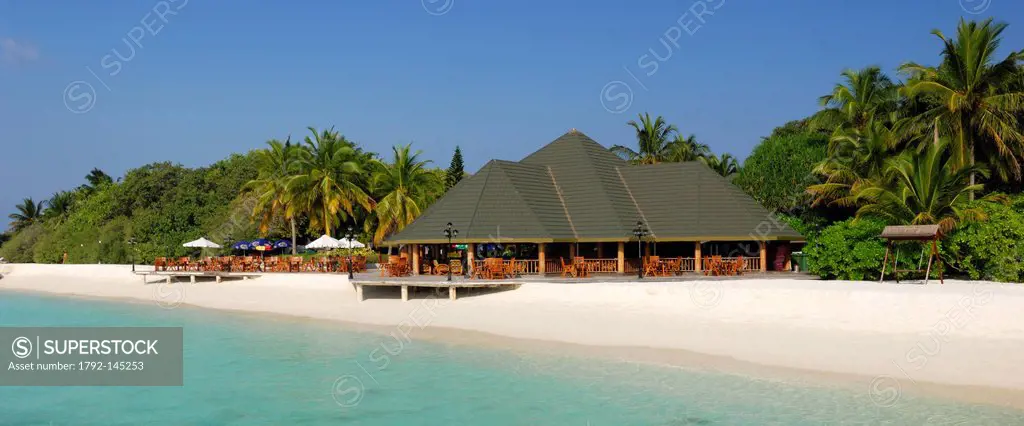 Maldives, North Male Atoll, Lankanfinolhu Island, Paradise Island Resort and Hotel, white sand beach, bar and restaurant on the seashore