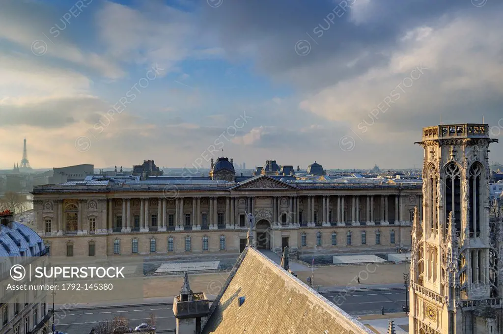 France, Paris, the Colonnade of the Louvre and the belfry of the city hall of the 1st arrondissement