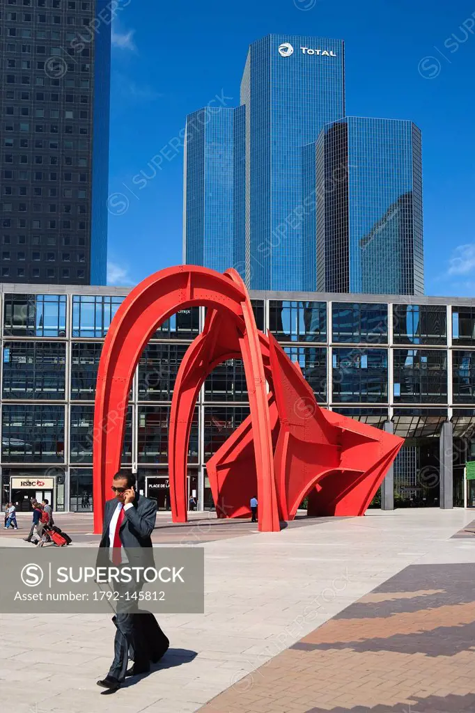 France, Hauts de Seine, La Defense, sculpture by Alexander Calder called L´Araignee Rouge and Total building in the background