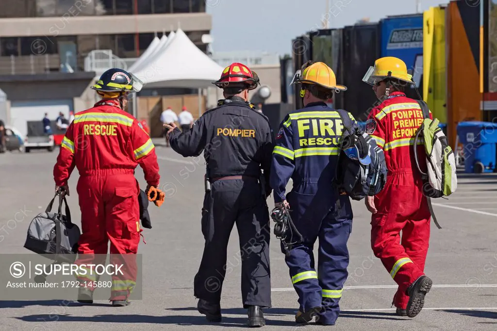 Canada, Quebec Province, Montreal, NASCAR race at the Circuit Gilles Villeneuve on Ile Notre Dame, firemen