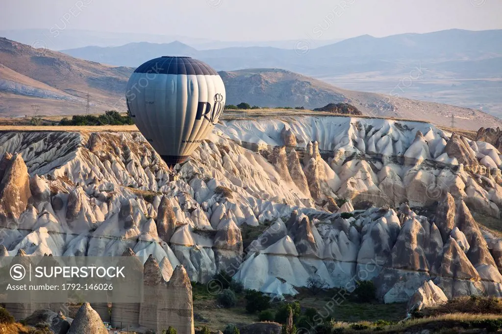 Turkey, Central Anatolia, Cappadocia, listed as World Heritage by UNESCO, Goreme valley, hot air balloons aerial view