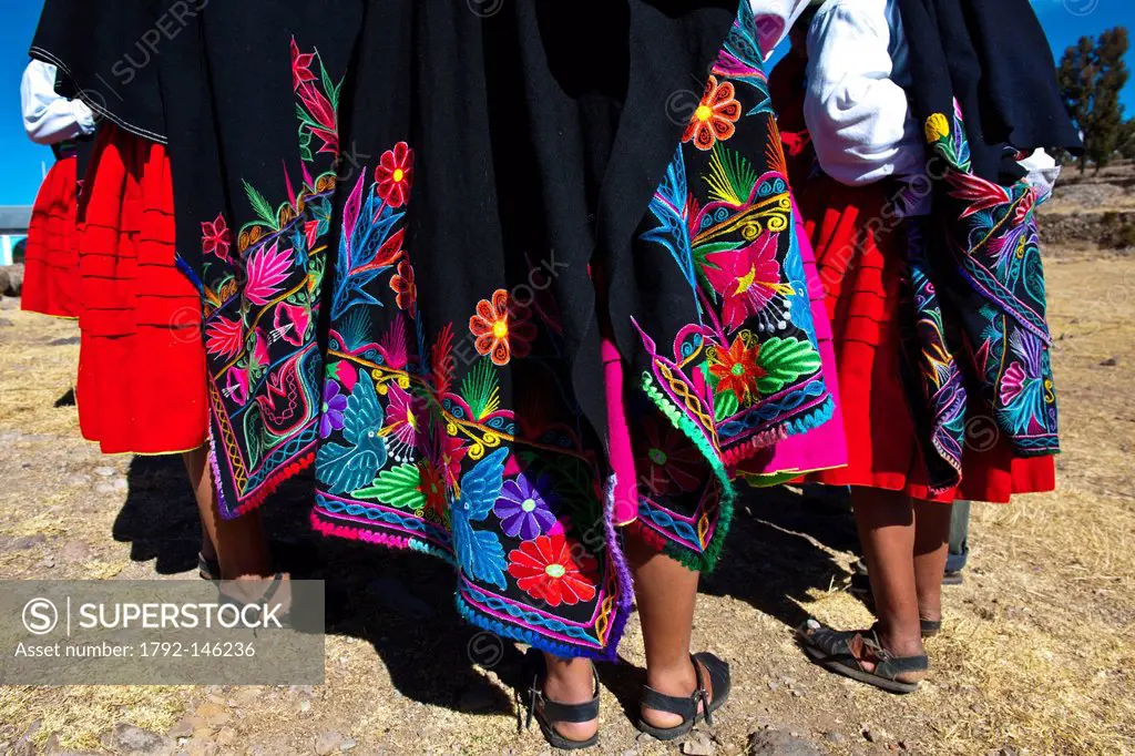 Peru, Puno province, Titicaca lake, Amantani island, Indian Quechua and embroidered poncho