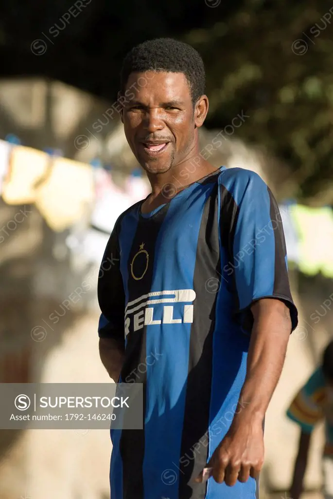 Cape Verde, Sao Vicente island, Sao Pedro, portrait of a man wearing a shirt of football