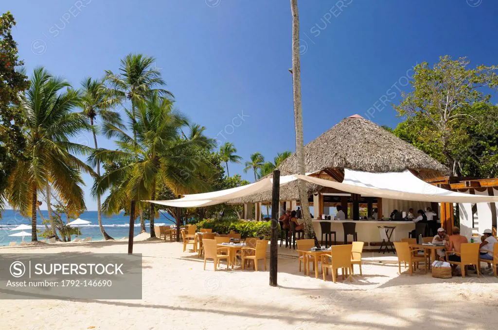 Dominican Republic, La Romana province, Casa de Campo, bar on the beach of white sand and sun beds at Casa de Campo