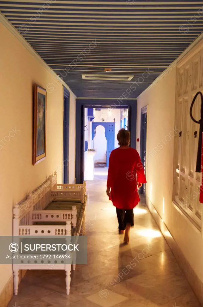 Tunisia, Sidi Bou Sad, Dar Sad hotel, charm residence, woman in the corridor