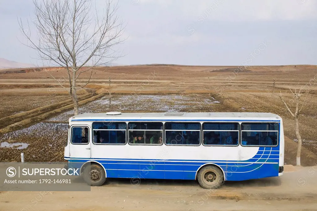 North Korea, North Pyongan province, Yongal, bus on a countryside road