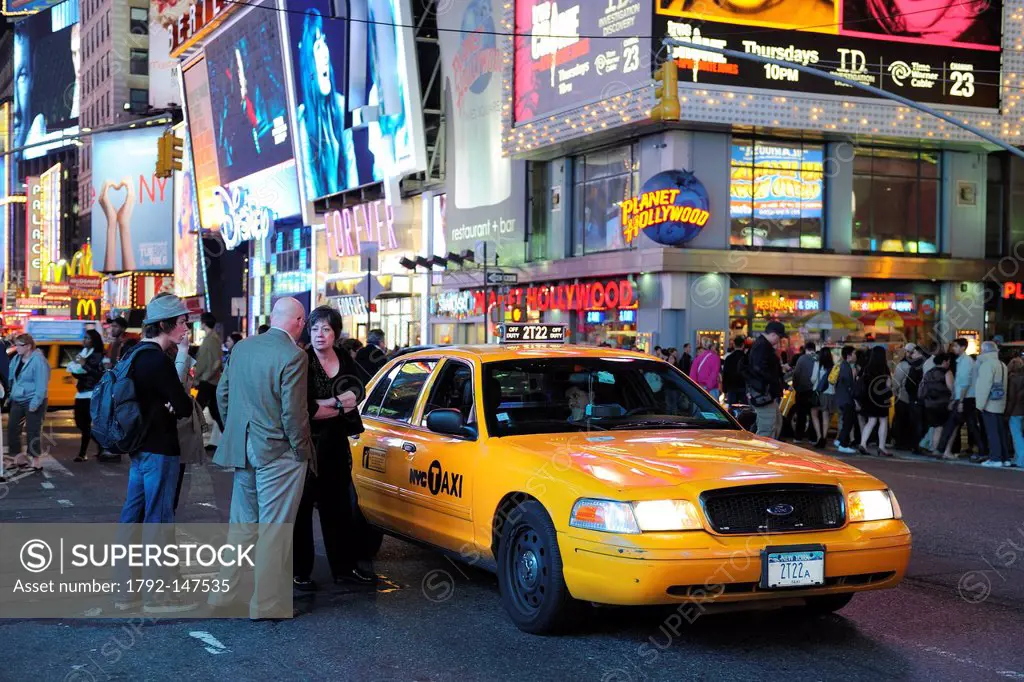 United States, New York, Manhattan, Theater district on Broadway Avenue, yellow cab in Times Square