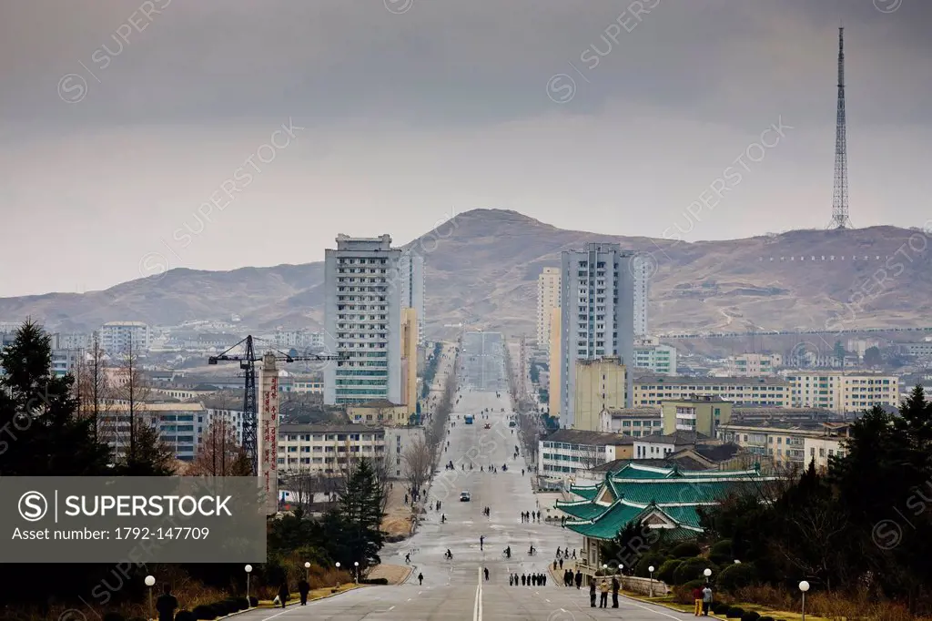North Korea, North Hwanghae province, Kaesong, Kaesong´s main avenue running downhill from a massive statue of Kim Il_Sung