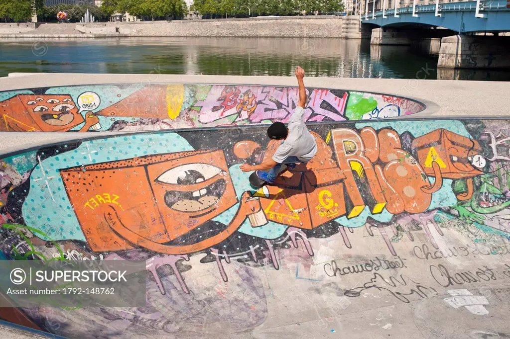France, Rhone, Lyon, the banks of the Rhone river, near the bridge Guillotiere, a large terrace houses two skate bowls built in 2006 by Skateparks Con...