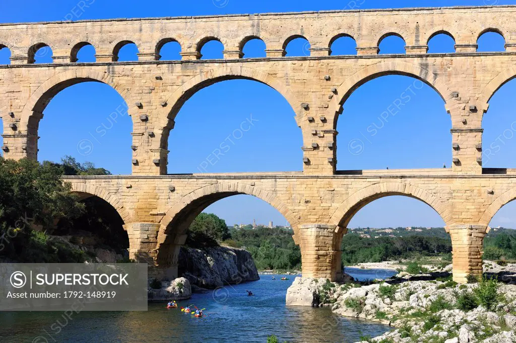 France, Gard, Pont du Gard listed as World Heritage by UNESCO, Roman aqueduct over Gardon River, canoeing