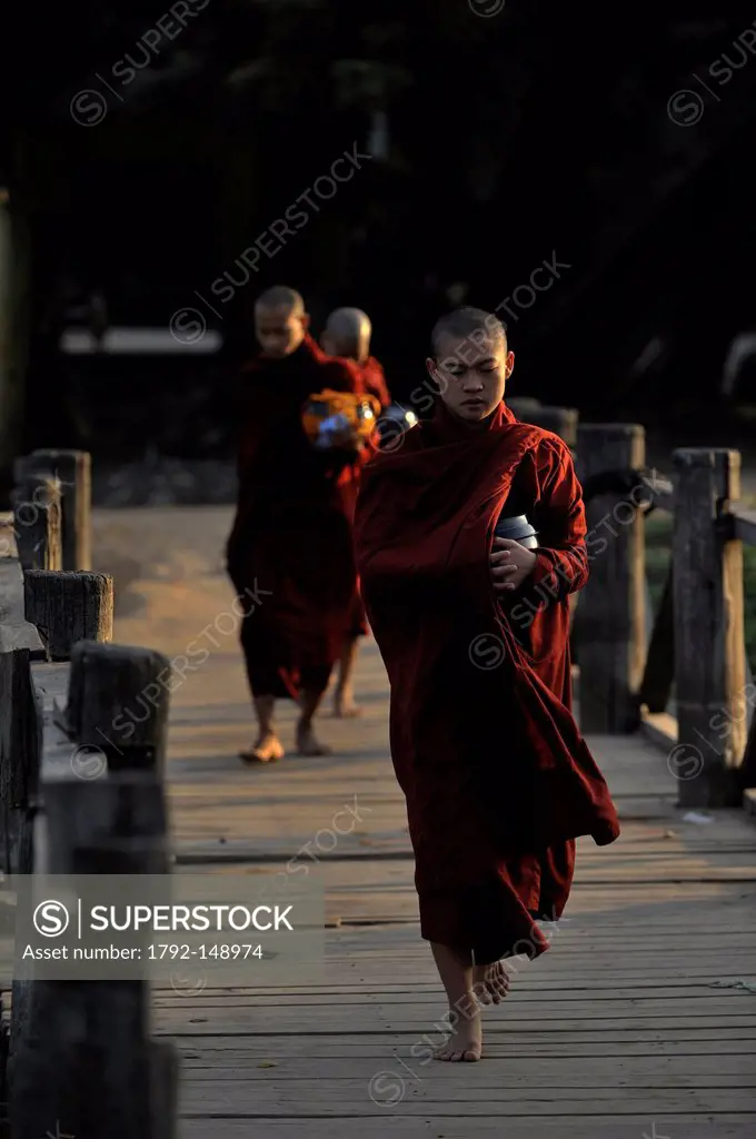 Myanmar Burma, Mandalay Division, Mandalay, Shwe in Bin Monastery, monk collection for charity