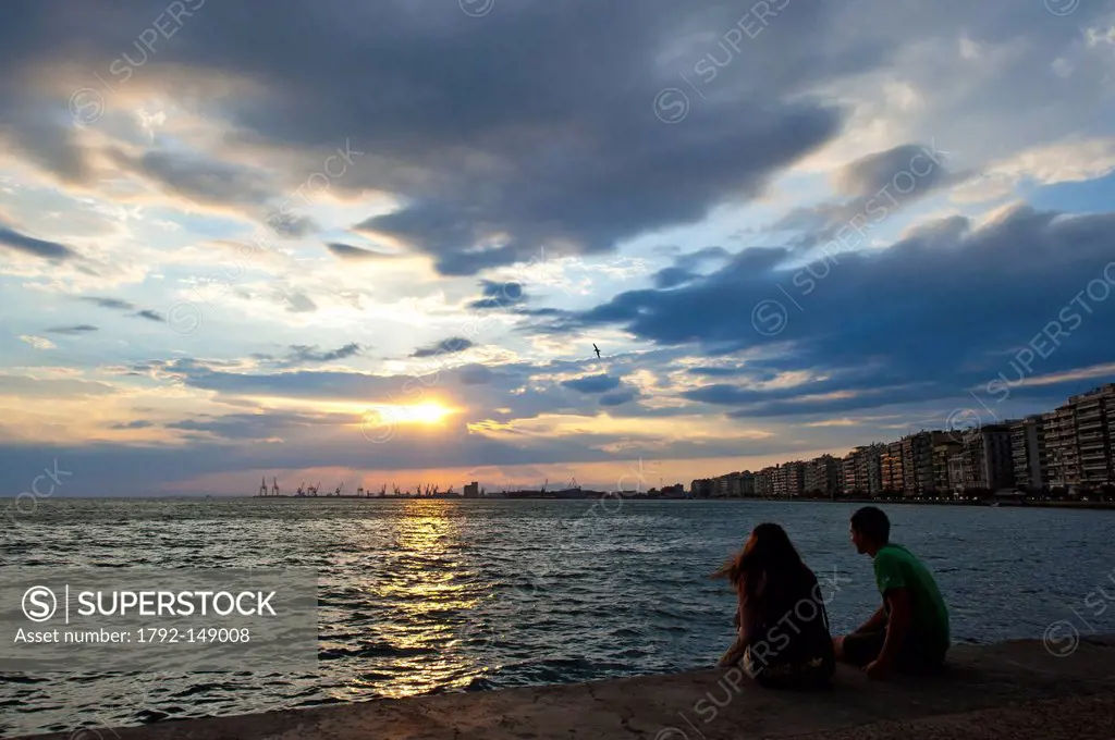 Greece, Macedonia, Thessaloniki, on the promenade by the sea Leoforos Nikis at sunset