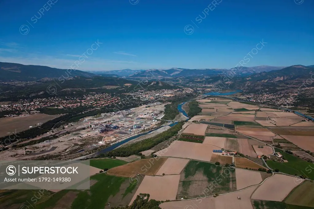 France, Alpes de Haute Provence, Chateau Arnoux Saint Auban, Arkema industrial area and Durance River aerial view
