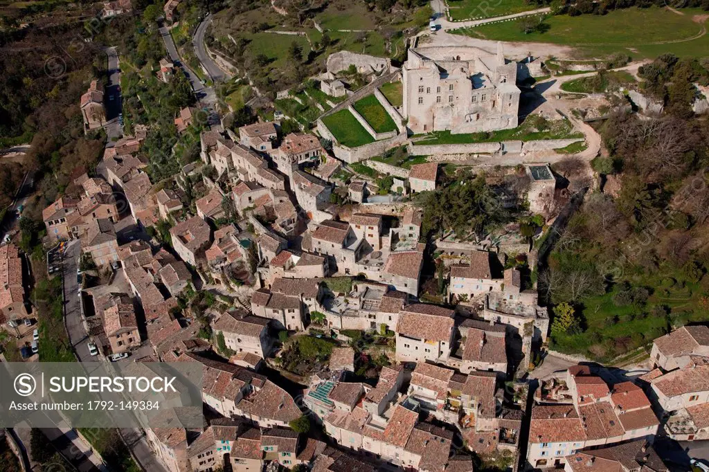 France, Vaucluse, Parc Naturel Regional du Luberon Natural Regional Park of Luberon, Lacoste, the castle owned by Pierre Cardin aerial view
