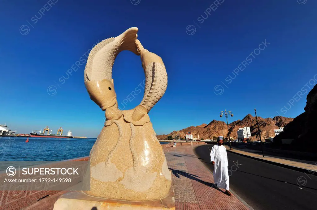 Sultanate of Oman, Muscat, statue of two fishes on the Corniche, alongside the Muttrah Port area