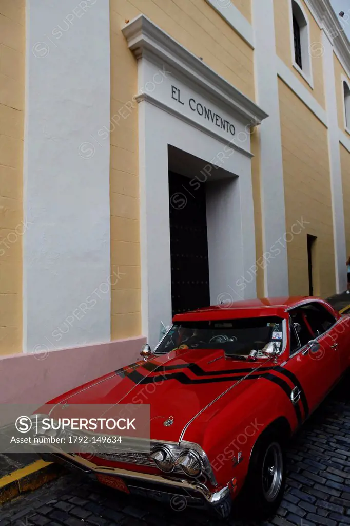 Puerto Rico, San Juan, the capital city, American car parked in front of El Convento luxury hotel, settled in an historic convent