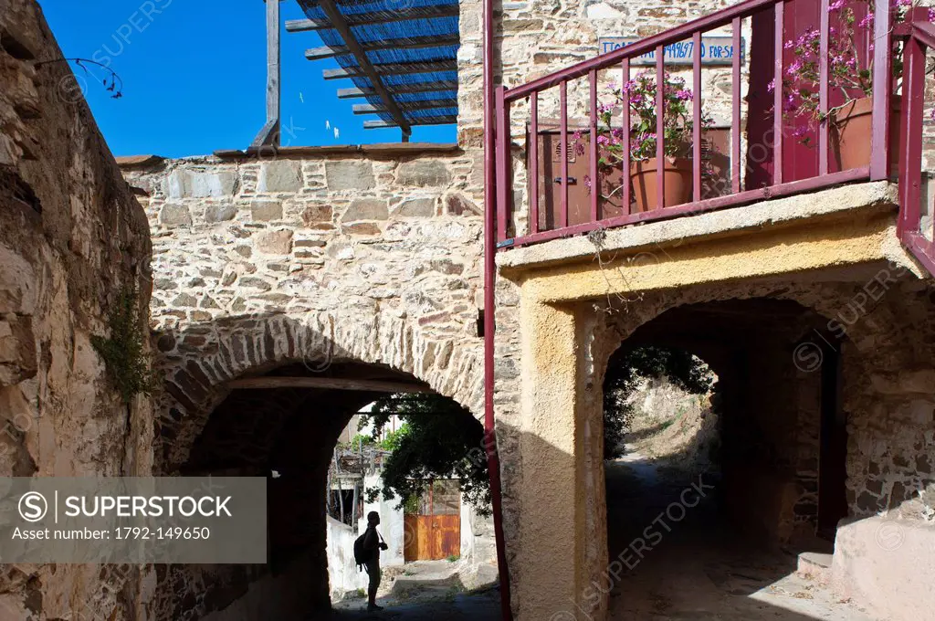 Greece, Chios Island, the picturesque village of Volissos topped by a Medieval castle, the alleys of the village
