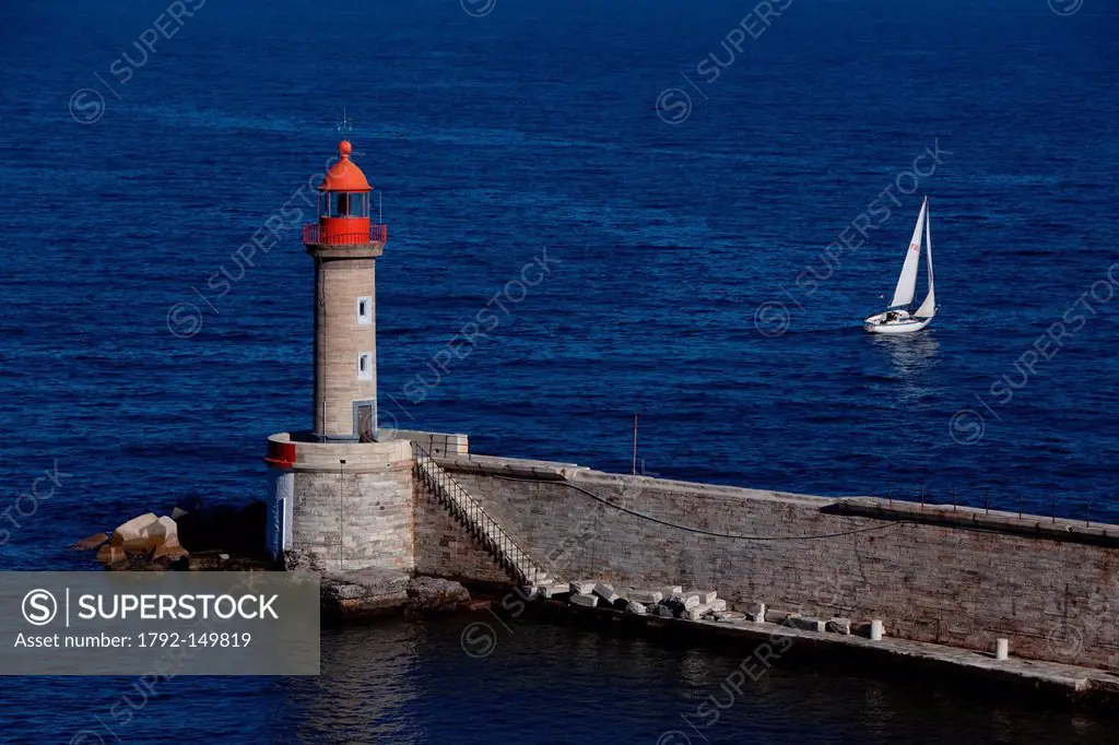 France, Haute Corse, Bastia, entrance to the old port, sailing boat