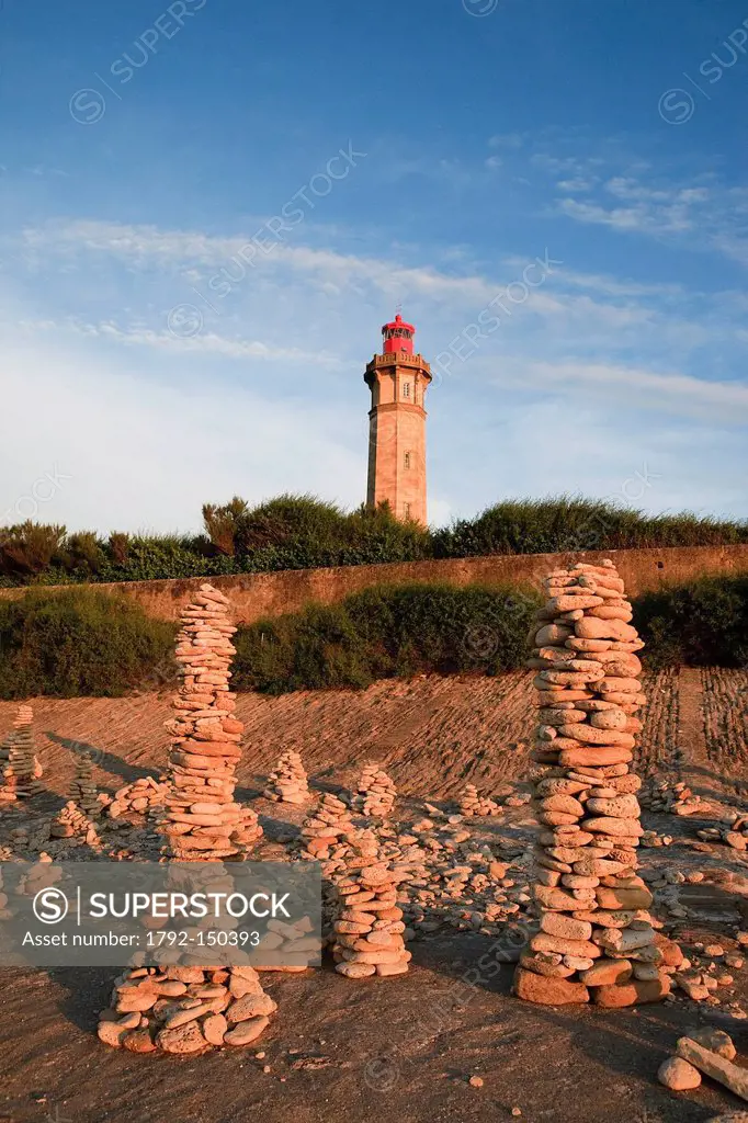 France, Charente Maritime, Ile de Re, Saint Clement des Baleines, cairns in front of the Phare des Baleines  Whales´ Lighthouse