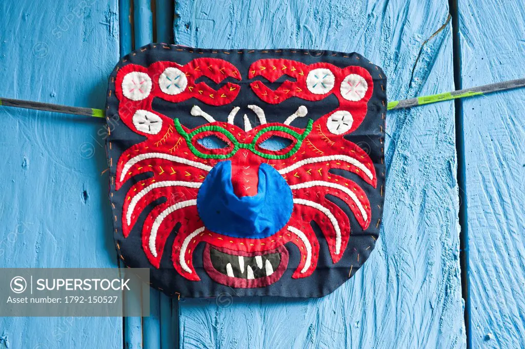 Panama, San Blas archipelago, Kuna Yala autonomous territory, Carti island, molas embroidered textiles by the Kuna indian, mask