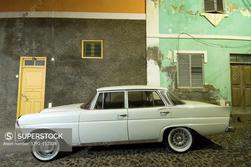 Cape Verde, Sao Vicente island, Mindelo, old Mercedes car under the light of a streetlight in the lanes of Mindelo