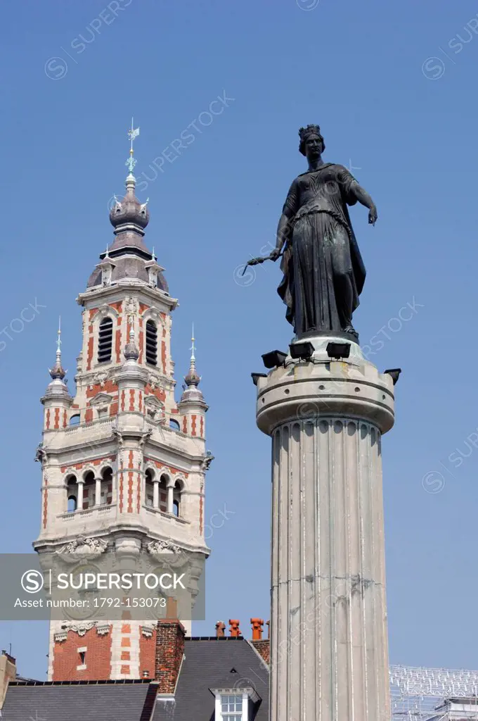 France, Nord, Lille, statue of the Goddess at the top of his column on the General De Gaulle Place or Grand Place and the belfry of the Chamber of Com...