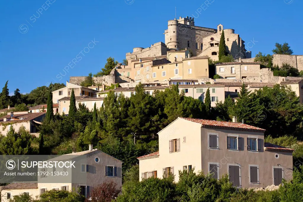 France, Vaucluse, Le Barroux with its castle on a limestone peak