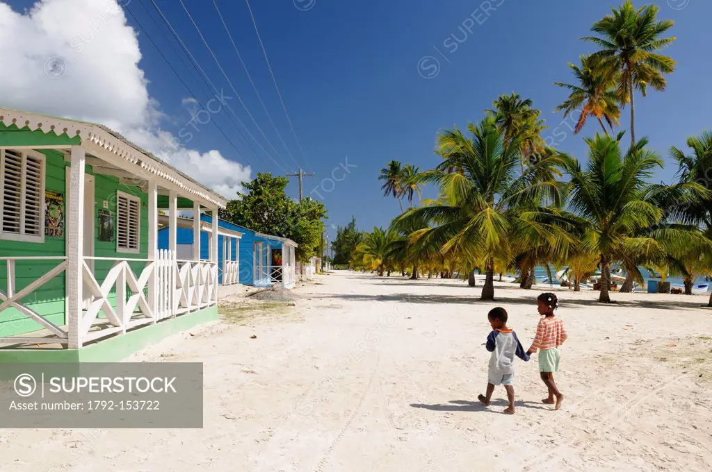 Dominican Republic, Samana peninsula, Del Este National Park, Saona Island, Dominican children and fishermen´s houses on the island of Saona
