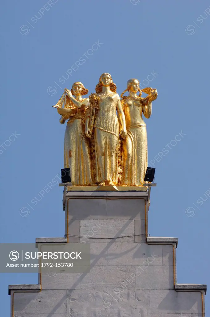 France, Nord, Lille, 3 golden statues atop the building´s facade of La Voix du Nord representing the Flanders, Hainault and Artois
