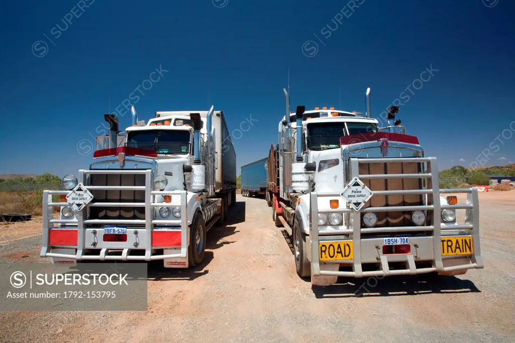 Australia, Western Australia, two roadtrains stopped at Whim Creek road house on the Great Northern Highway, south of Port Hedland