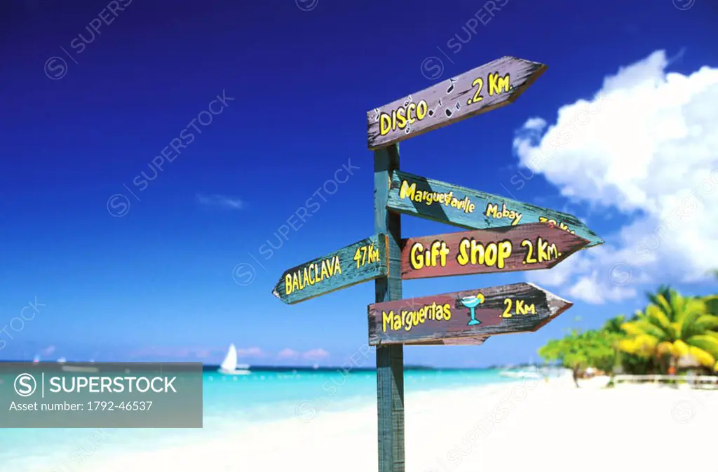 Jamaica, Westmoreland Parish, Negril, signpost on the beach