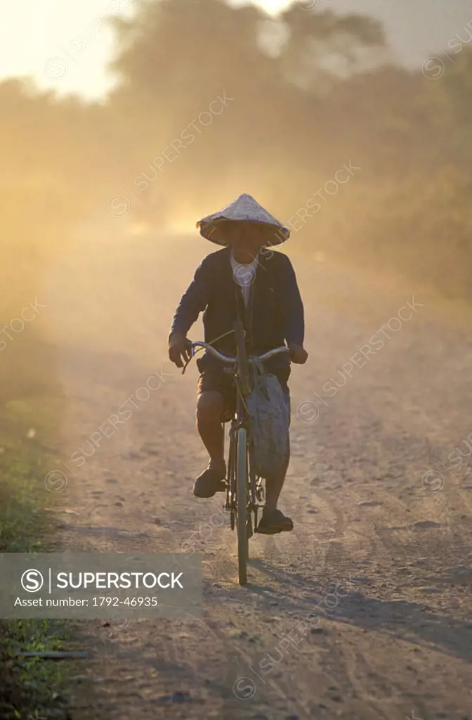 Laos, Viangchan Province, Vang Vieng, a cyclist