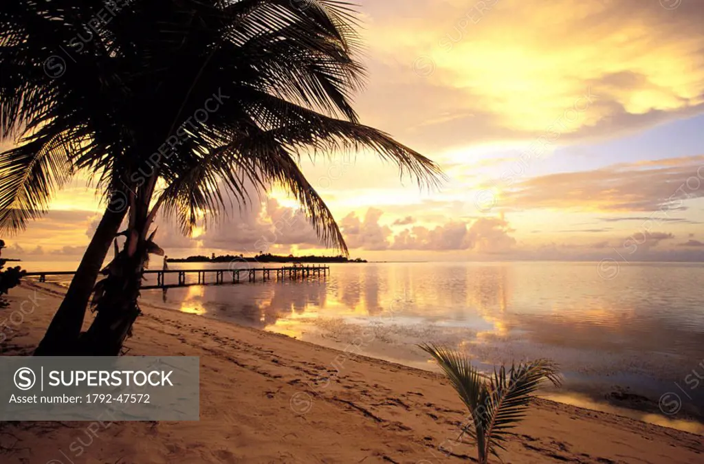 Cayman Islands, Little Cayman, sunrise on the South coast in the back Owen Island (natural reserve)