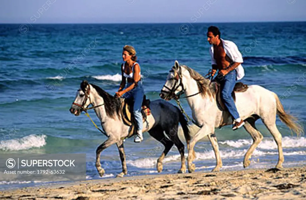 Tunisia, riding on the beach (Model Release OK)