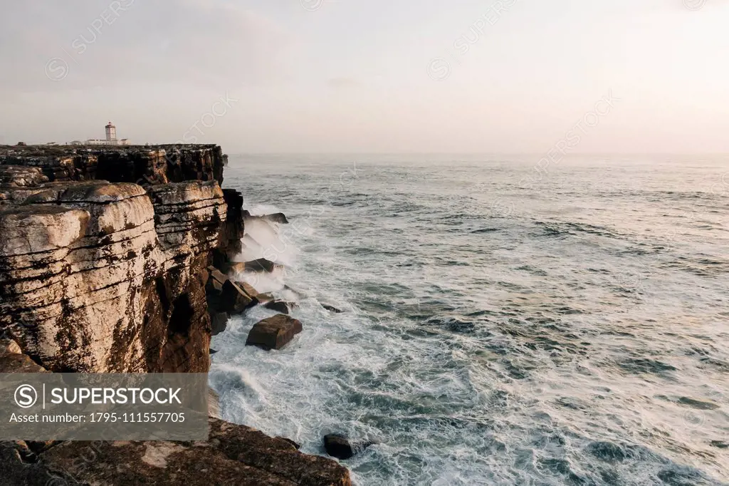 Building on cliff by sea in Peniche, Portugal