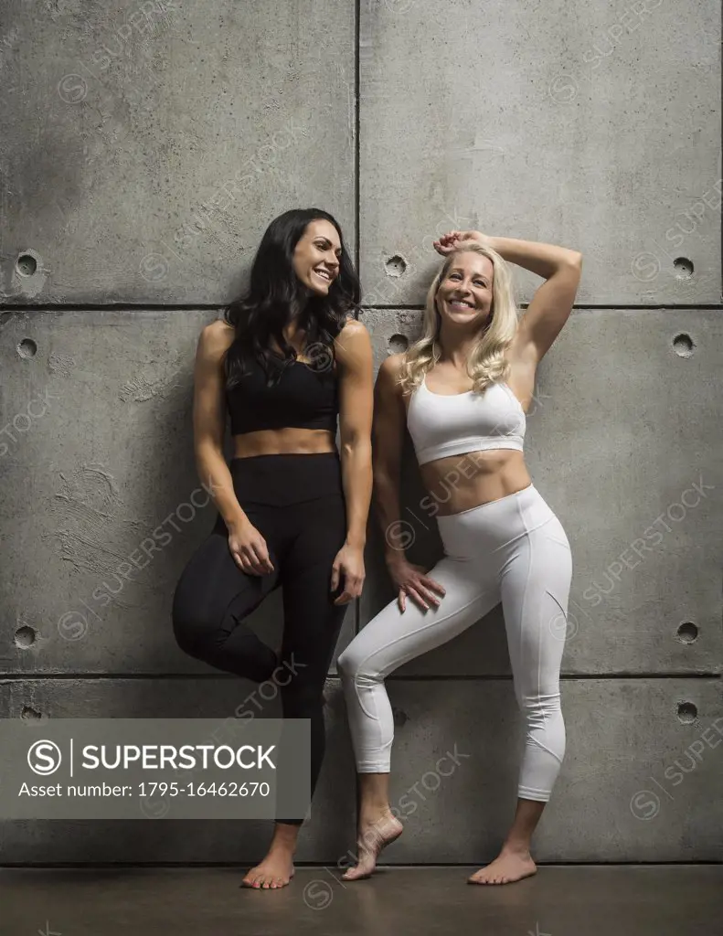 Portrait of two sporty women