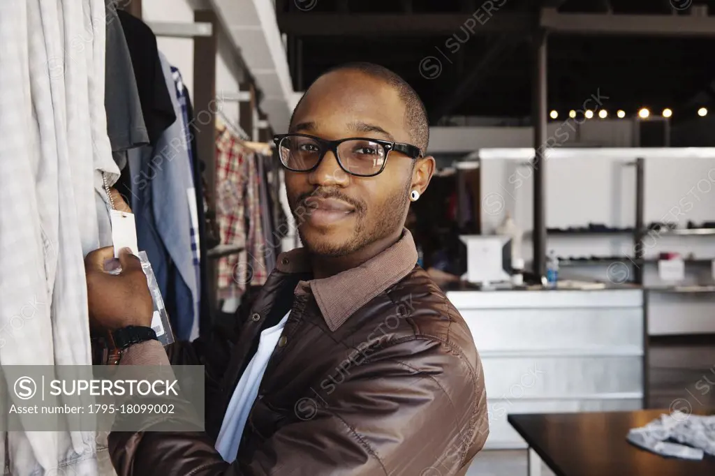 African American man shopping in clothing store