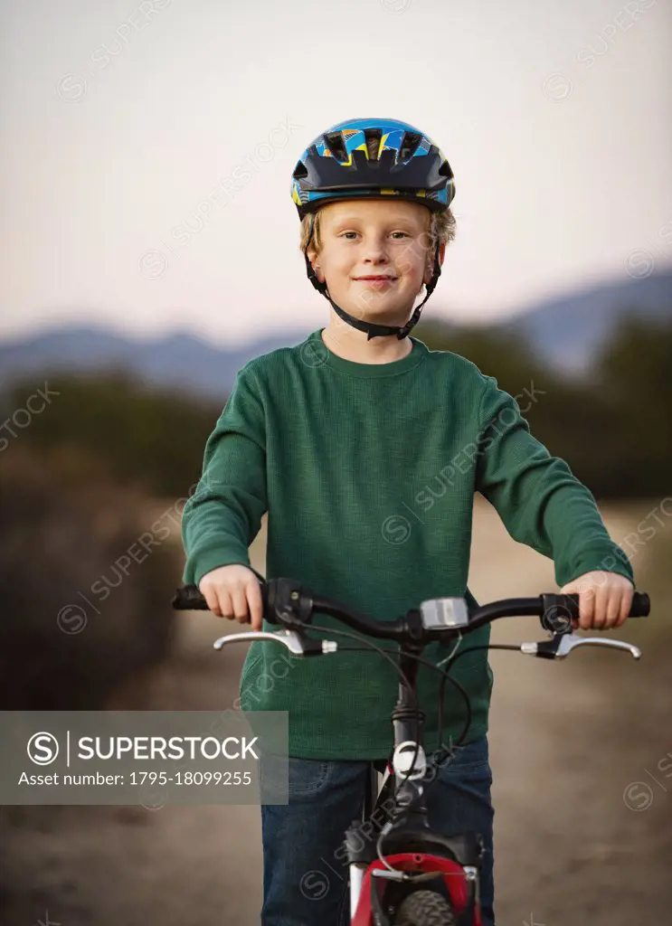 United States, California, Mission Viejo, Portrait of boy (10-11) on bicycle