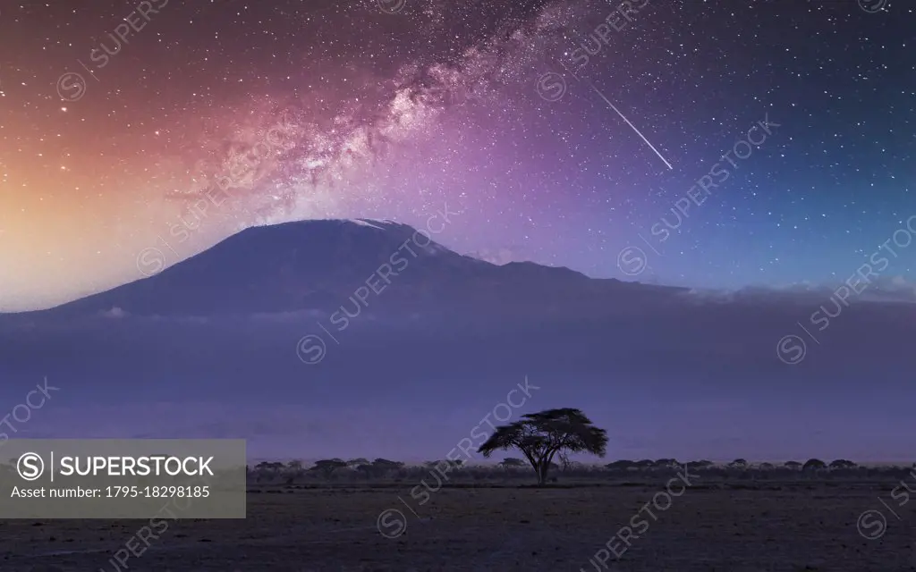 Africa, Kenya, Milky way and falling star over Mount Kilimanjaro in Amboseli National Park